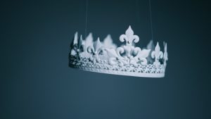 paper crown suspended in the air