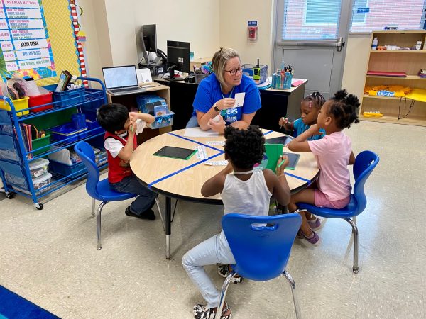 Rising kindergarteners at Renaissance West STEAM Academy work on reading skills through the YMCA's Y Readers summer program.