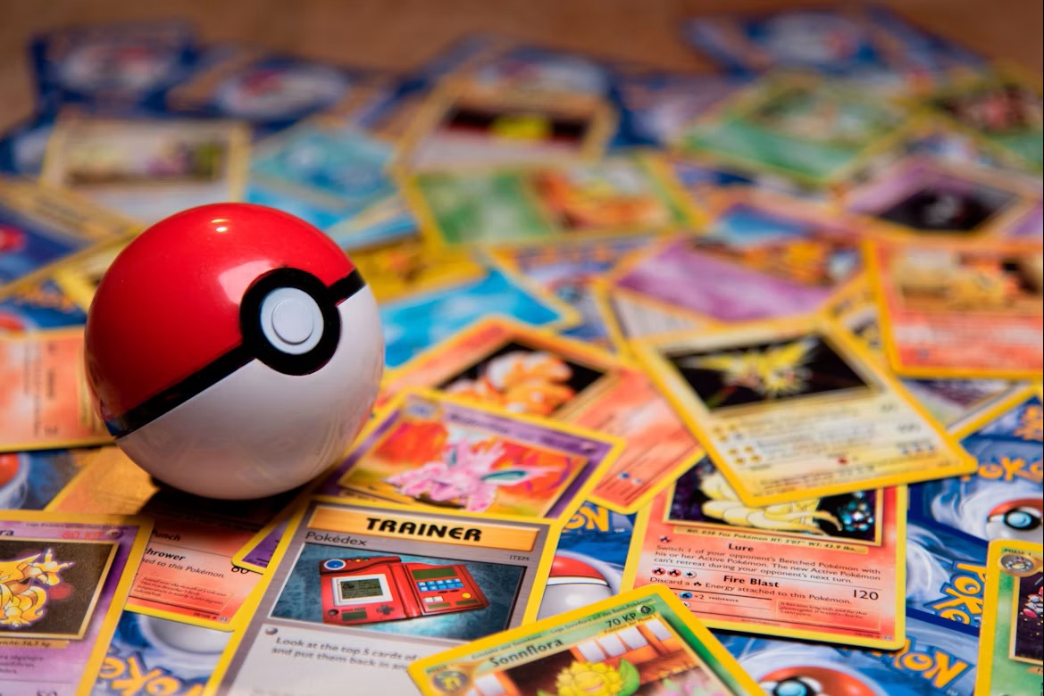 Pokeball on a pile of Pokemon cards