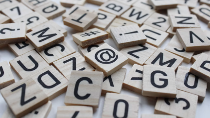 a pile of letter tiles